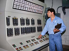 Hemlock plant interior with technician