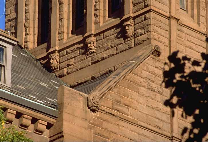 Close Up of Faces on City Hall Building